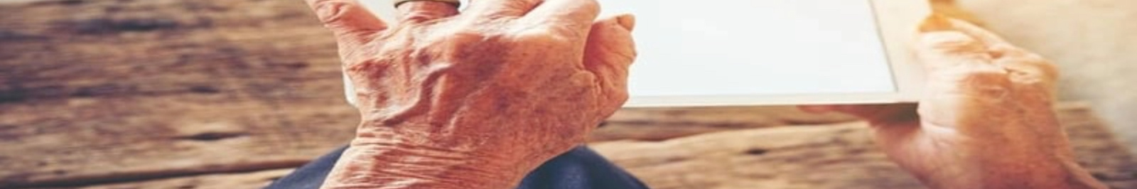 Close-Up-Elderly-Man-Using-Tablet